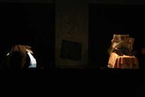 Gus ties while Ben reads.