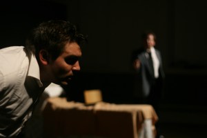 Gus enters from the passage door.