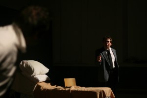 Ben is standing by the kitchen door.